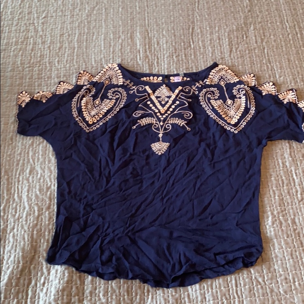 Blue flowy top with shoulder cutouts!